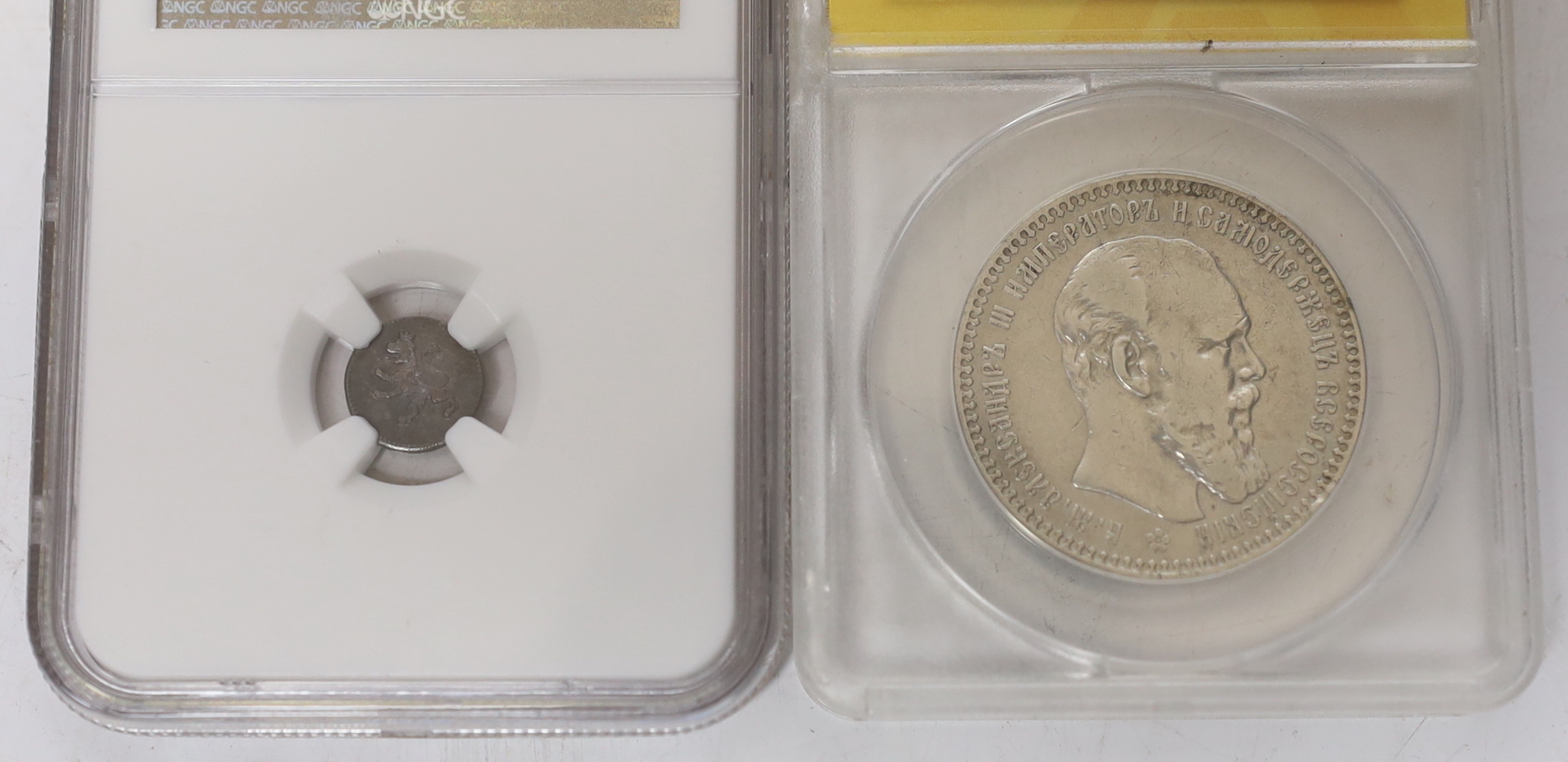 Russia One rouble 1893, ANACS graded VF 35, British India 2 Annas 1862 (C), NGC graded UNC, damage to obverse, Guatemala quarter real, 1819 G, NGC graded MS 65 (the highest graded example by NGC), Sweden 1/6 skilling 184